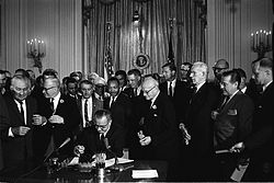 250px Lyndon Johnson signing Civil Rights Act July 2 1964