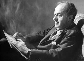 Hecht writing and smoking