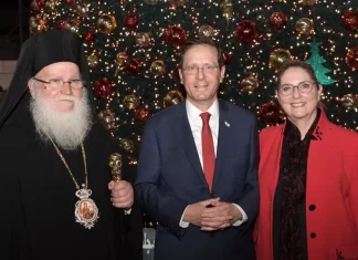 Ahead of Christmas President Isaac Herzog and the First Lady visit Nazareth and meet the leaders of the Christian churches in Israel at the citys traditional Christmas tree1 e1639758064836
