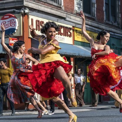 This image released by 20th Century Studios shows, from left, Ilda Mason as Luz, Ariana DeBose as Anita, and Ana Isabelle as Rosalia in "West Side Story." (Niko Tavernise/20th Century Studios via AP)