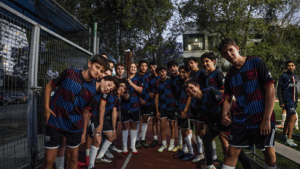 Youth at Centro Deportivo Israelita with the M25 Maccabiah Torch photo credit to Courtesy 500 x 281